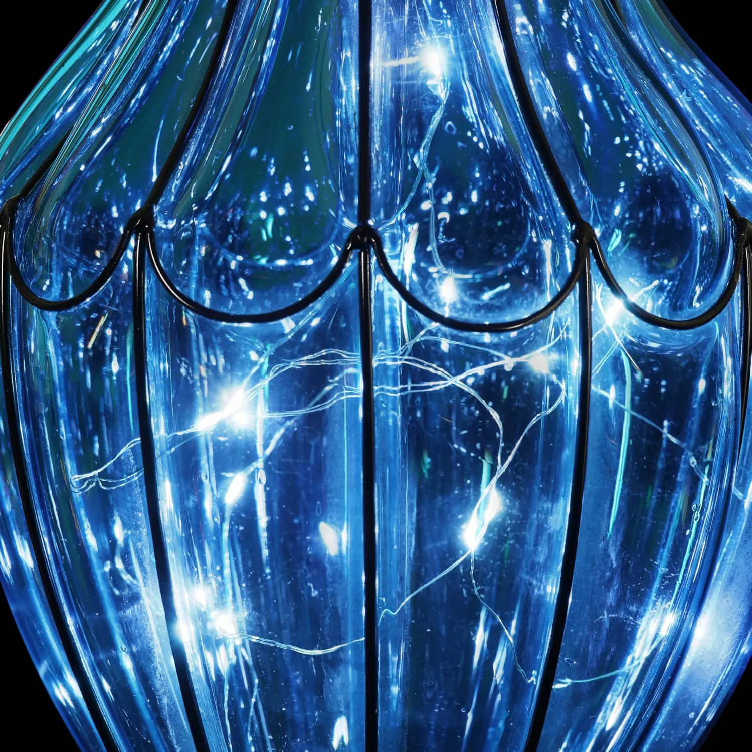 Solar Blue Glass Hanging Lantern with Waving Metal Pattern, 7.5 by 25 Inches